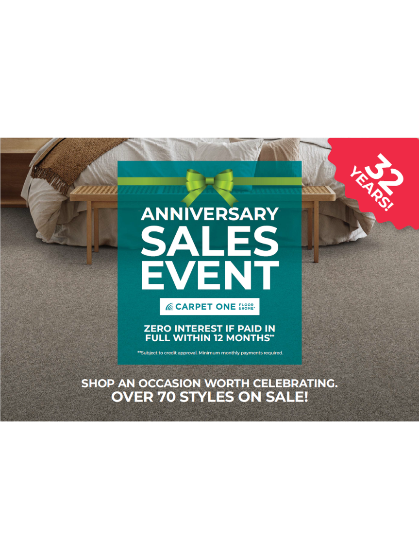 Dad pushing Daughter in Cardboard Box on Hardwood Floors